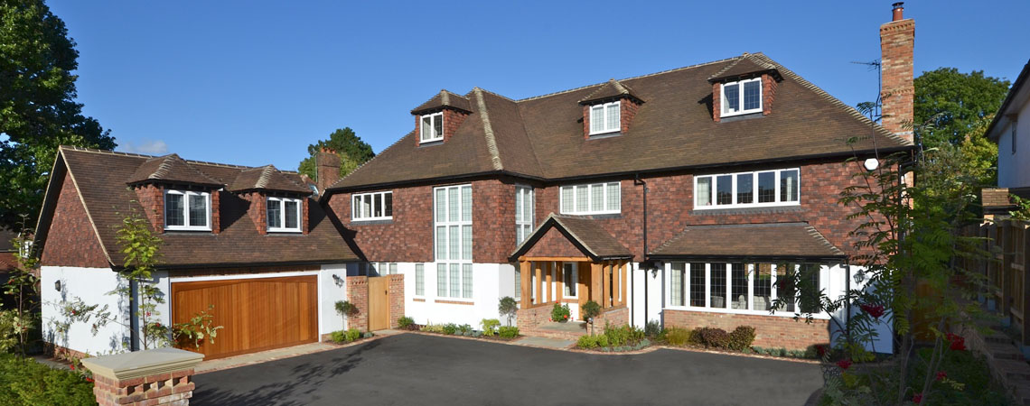 Two-storey rear extension and new family room with fitted kitchen on a detached home in a Sevenoaks outlying village — 2012 build by Simon King Construction
